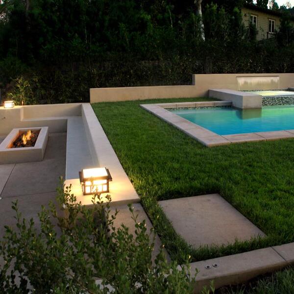 Sunken Fire Pit Features Glass Walls For Ultimate Viewing